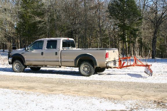 Plow snow with a vehicle 3 point hitch called a T-Point Lift